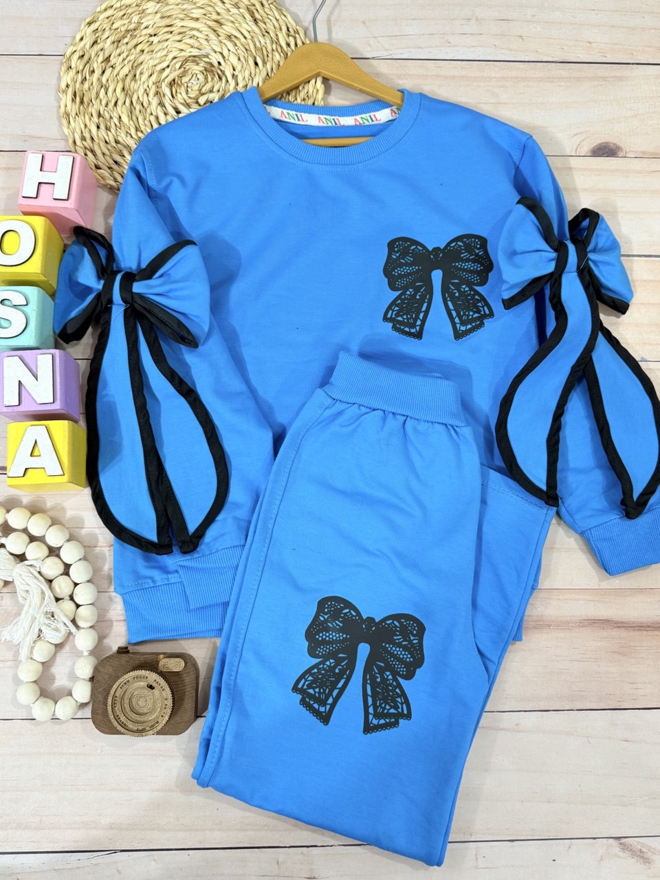 عکس محصول ست بلوز شلوار مینیمال گره - شماره 2