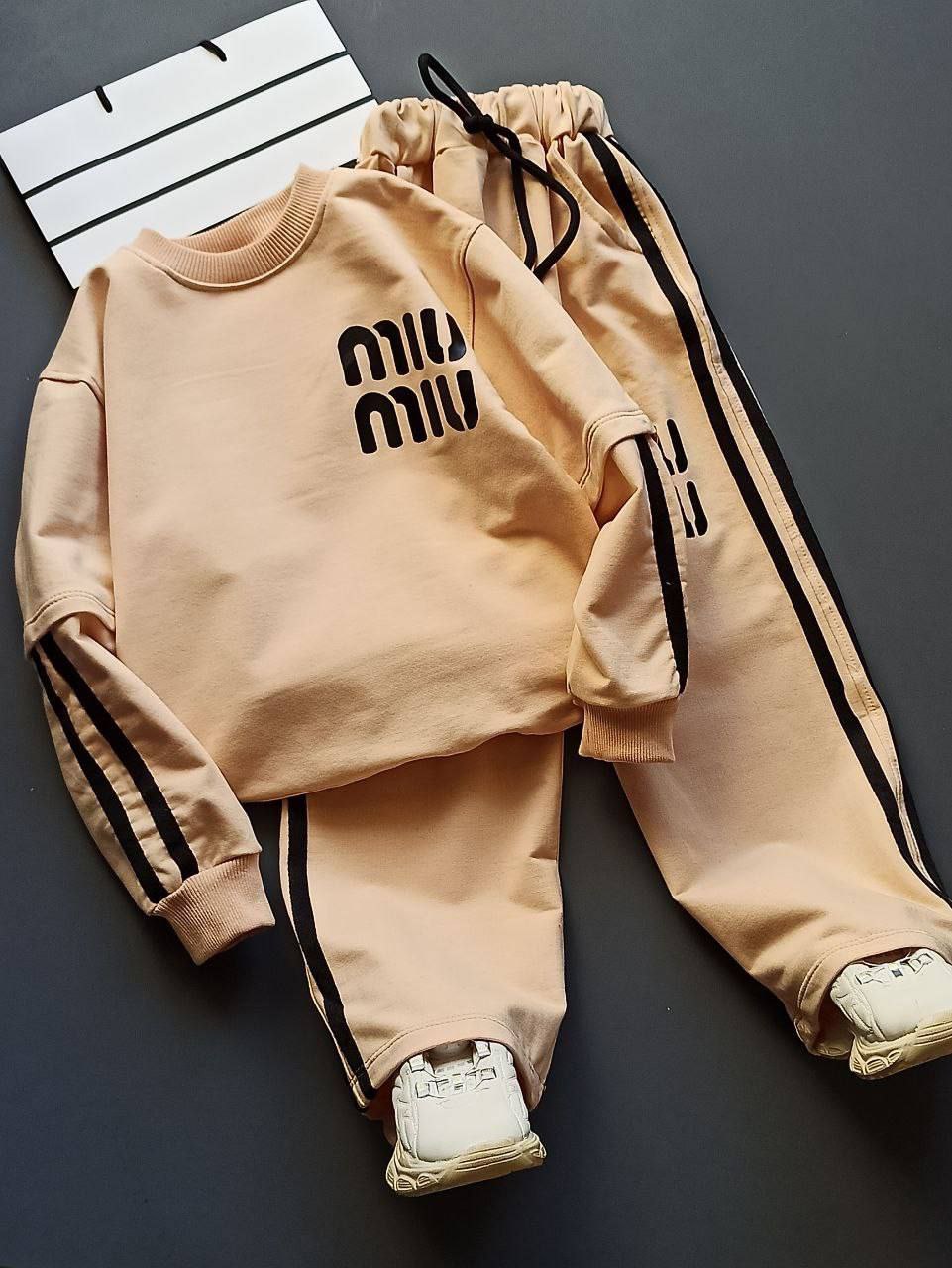 عکس محصول ست بلوز با شلوار miu miu  آستین دو خط - شماره 1