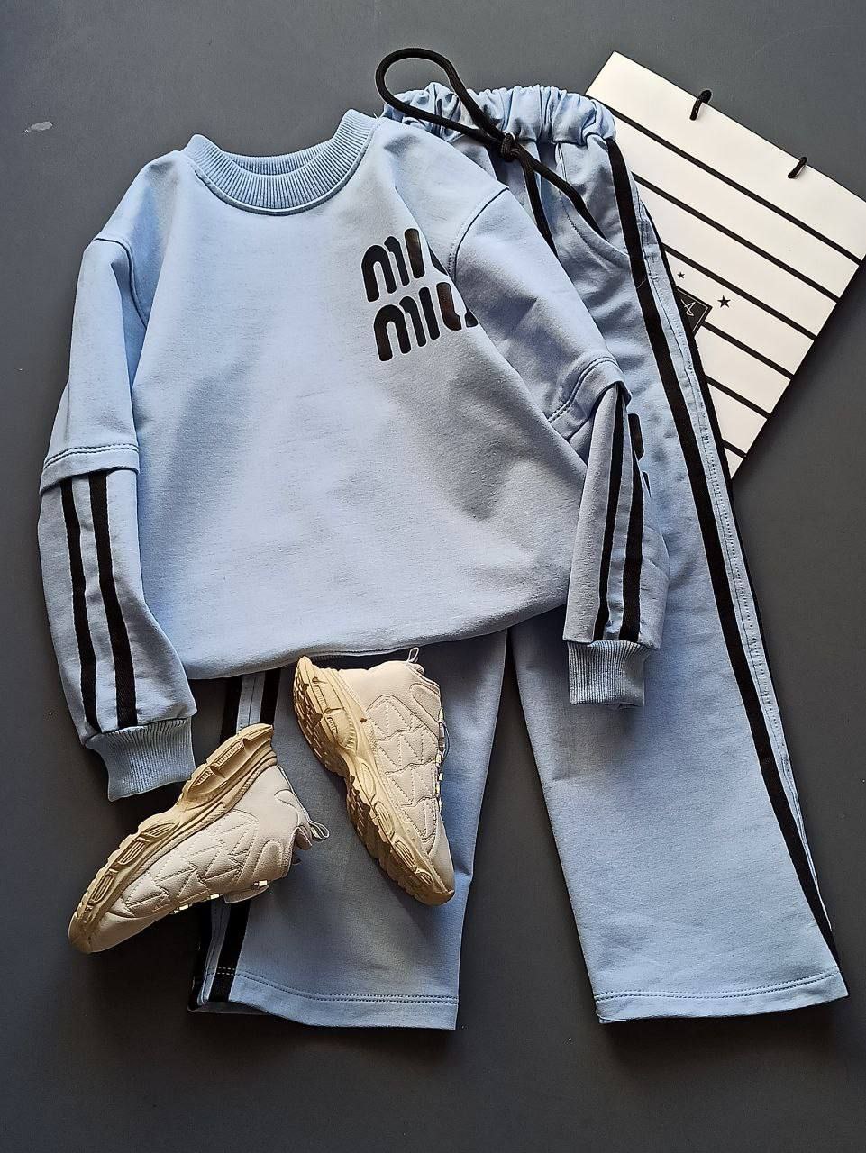 عکس محصول ست بلوز با شلوار miu miu  آستین دو خط - شماره 2